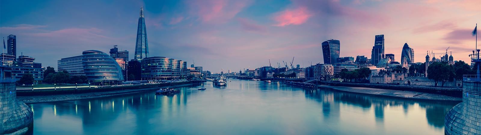 London skyline at night from the view of the river Thames.